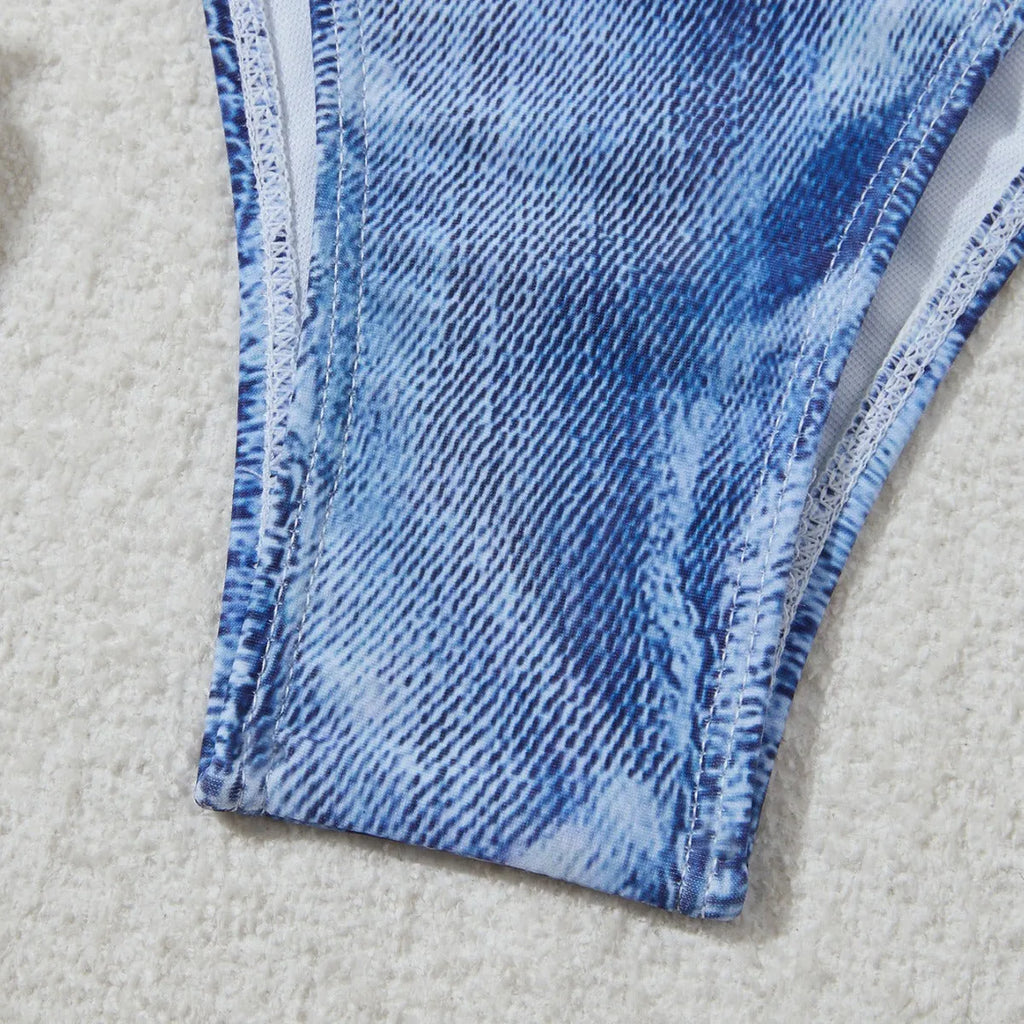 Women's denim blue printed bikini set with adjustable straps, shown as a two-piece swimsuit.
