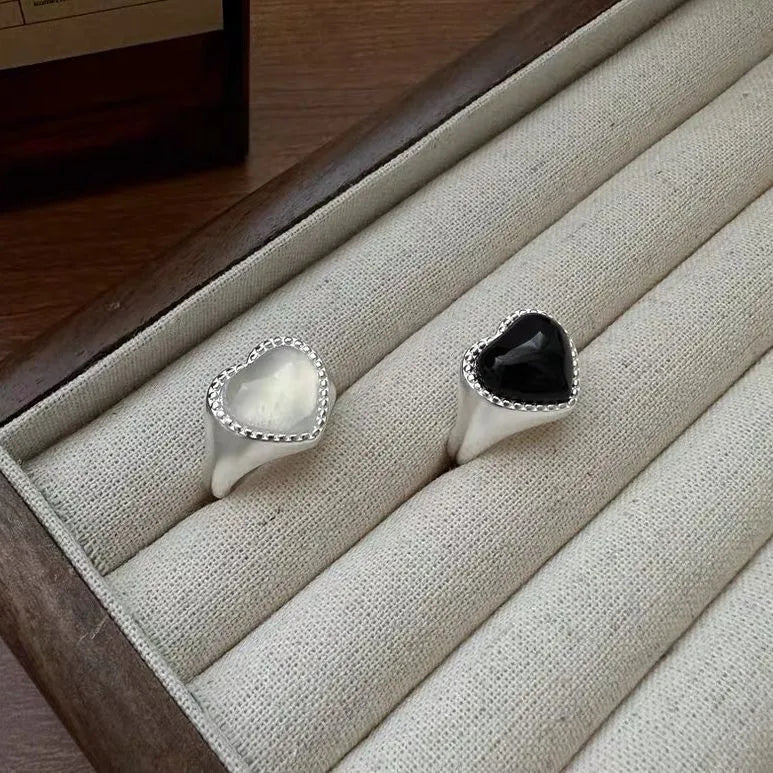 Adjustable sterling silver ring with heart-shaped black agate stone and open mouth design