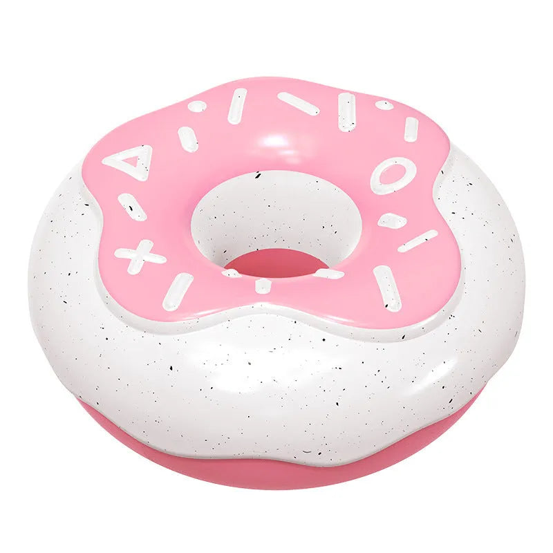 Pink donut-shaped dog chew toy with textured surfaces for dental cleaning