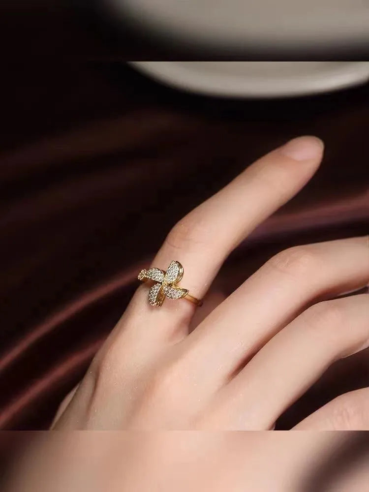Geometric spinning windmill ring in electroplated copper with gold or silver colour option