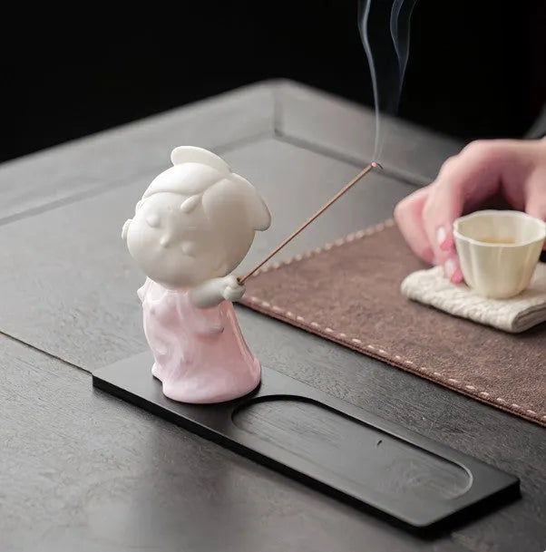 Ceramic little female court attendant incense burner decoration in cute style.