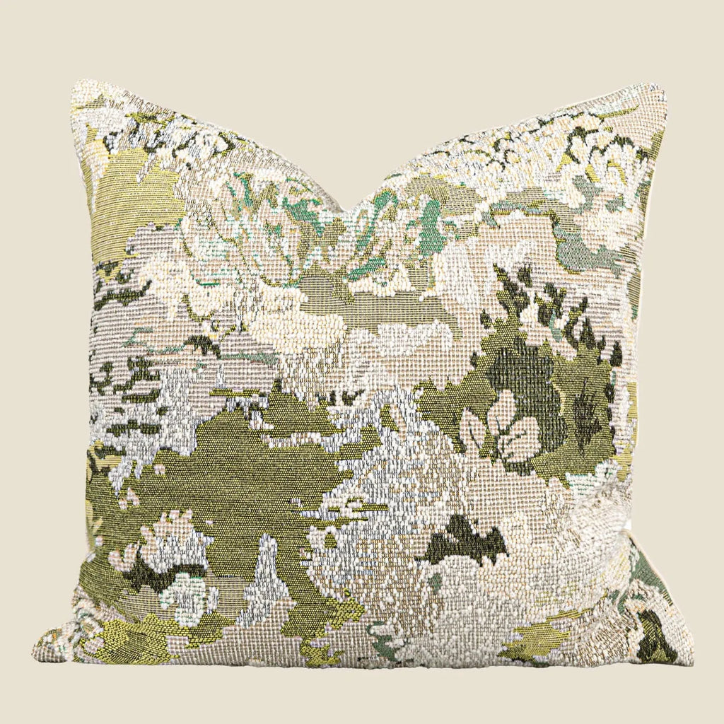 Green abstract floral pattern on a square wool blend decorative cushion pillow.