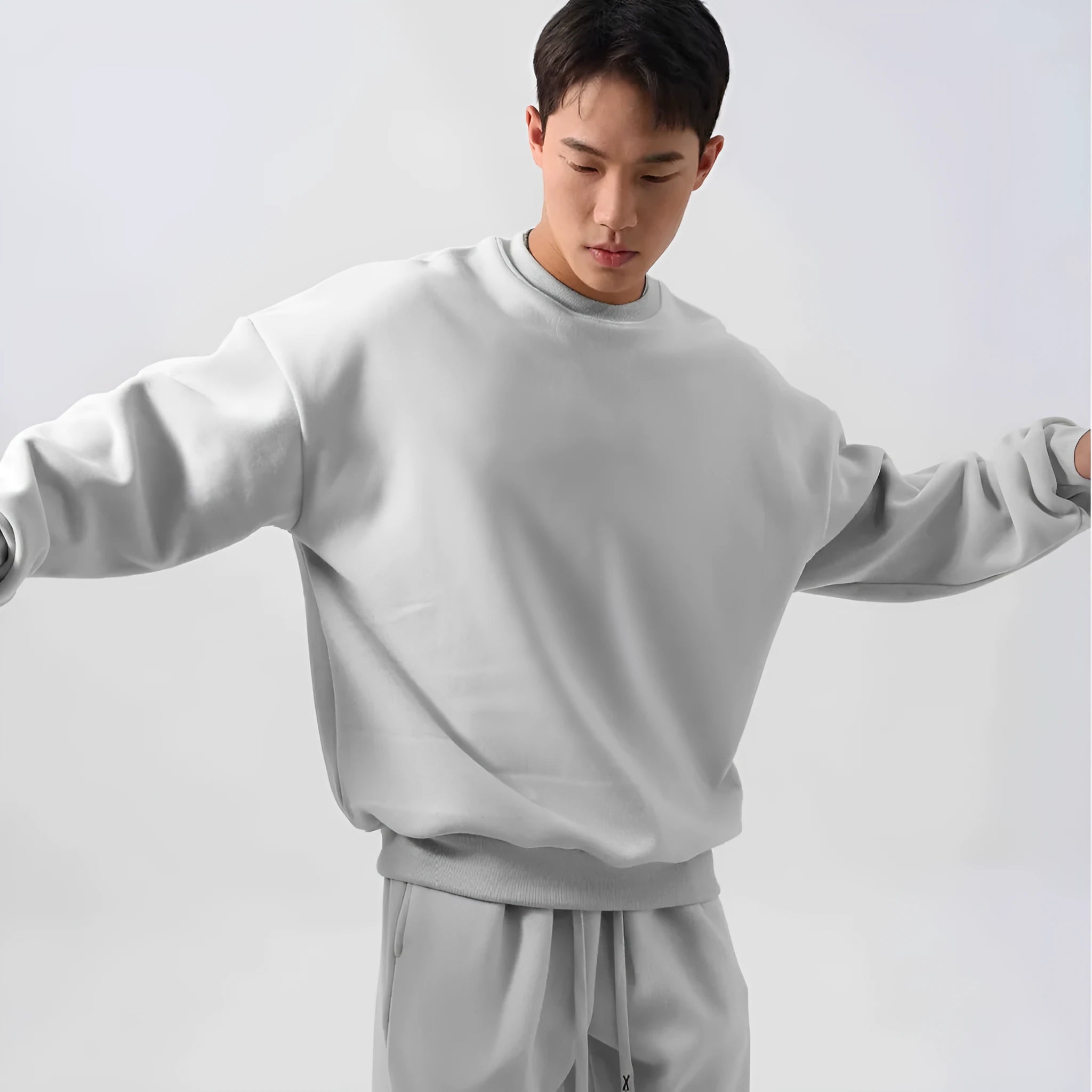 Men's loose polar fleece sports suit in army green with long sleeves and padded trousers