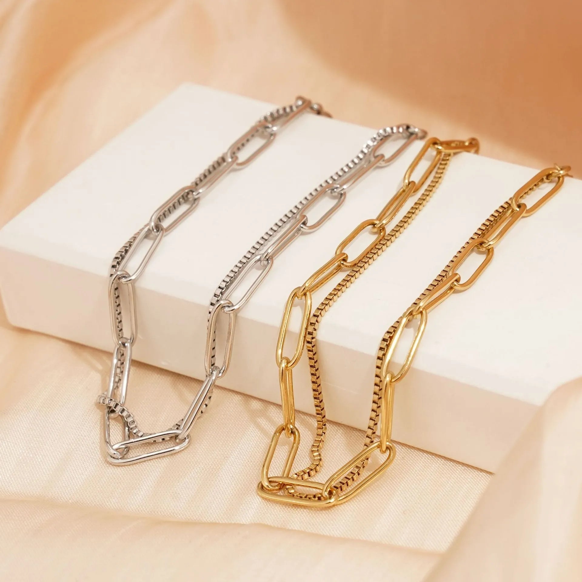Double-layer titanium steel women's bracelet with geometric shape and linear design elements in gold or silver finish