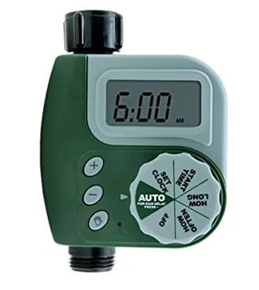 Green digital garden hose timer with copper connector and programmable watering display