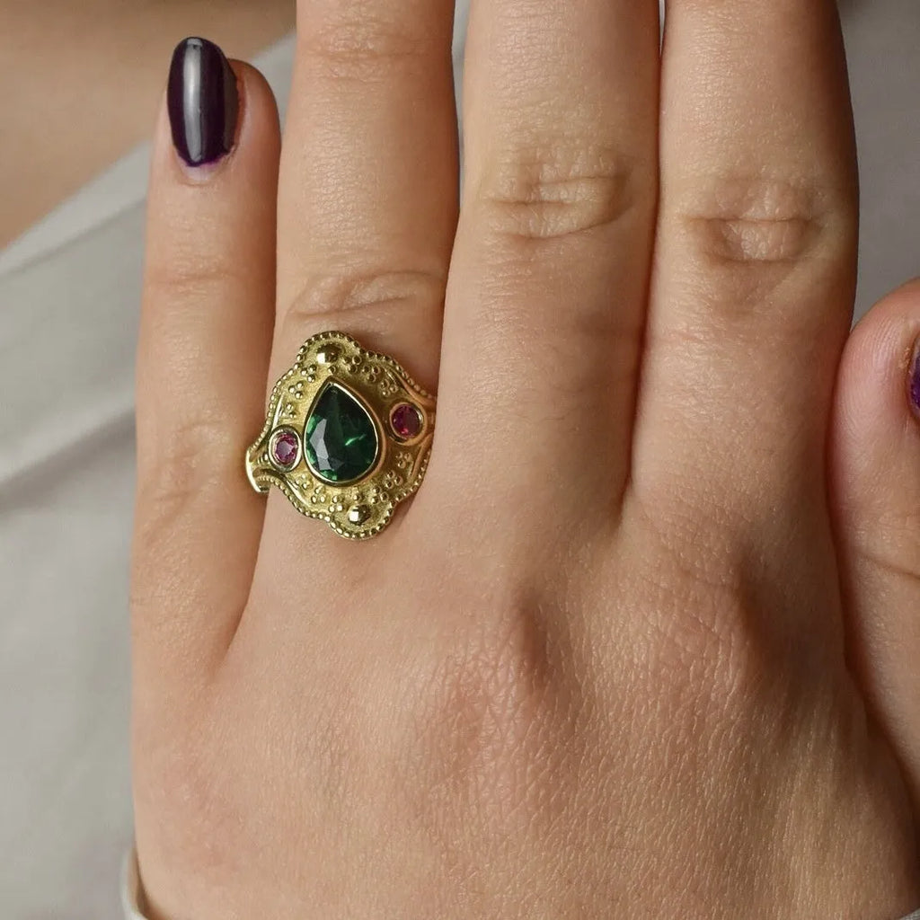 Golden geometric women's fashion ring on a plain background, showing its gold-plated alloy construction and ins style design.