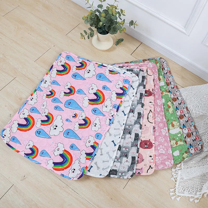 Reusable washable pet urine pad with colourful animal print design on cloth with waterproof base.
