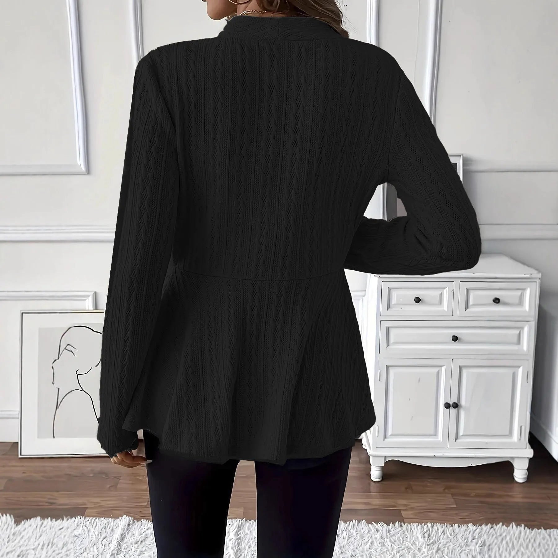 Women's apricot knitted cardigan with one button and jacquard texture on hanger