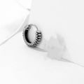 Silver geometric striped drop earrings with retro twist design and round sports-style elements