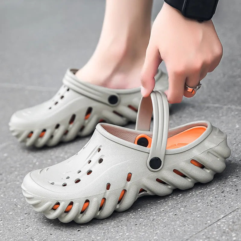 Men's beige outdoor slipper sandals with hole design and non-slip sole on grey background