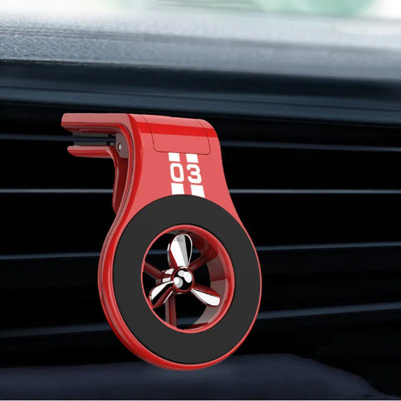 Black magnetic car air vent phone holder with adjustable angle and built-in perfume diffuser.