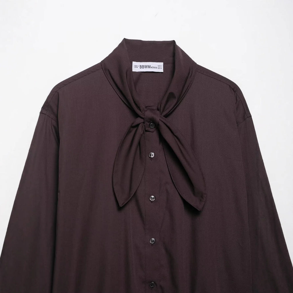 Brown women's poplin shirt with built-in scarf and bow tie detail, loose fit design