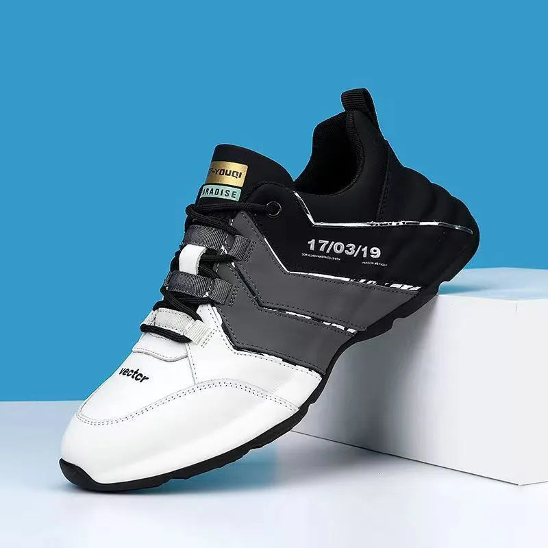 Casual sneakers with mesh lining and plastic soles in black and grey colour