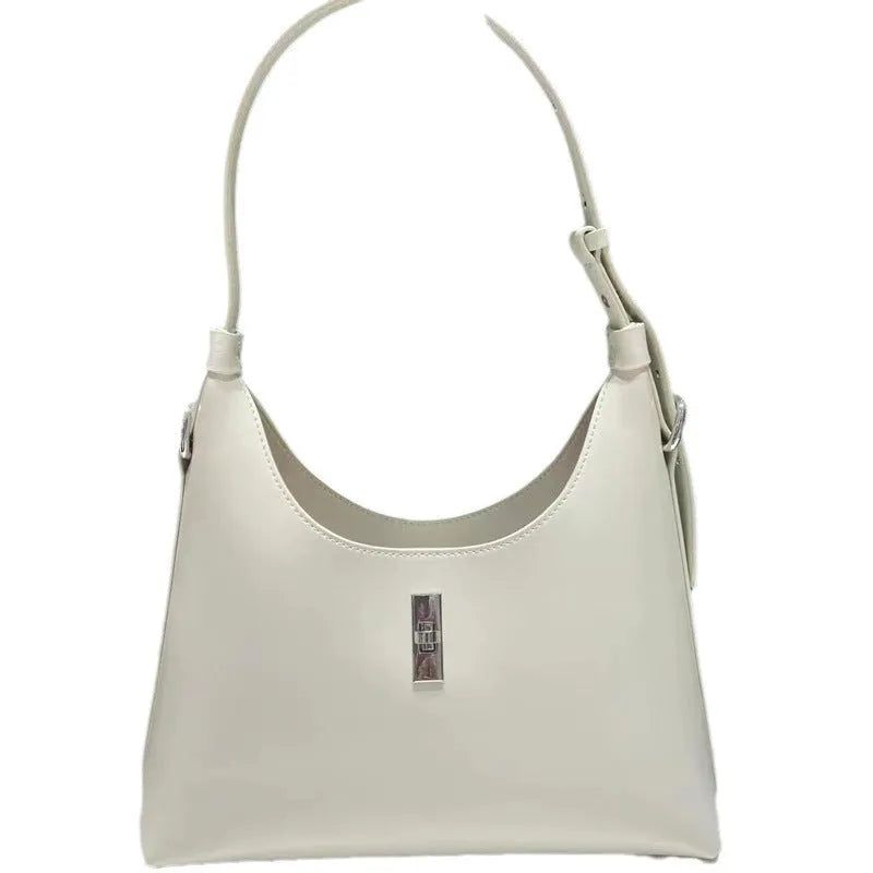 Genuine leather dumpling-shaped crossbody bag with organised compartments in six colour options