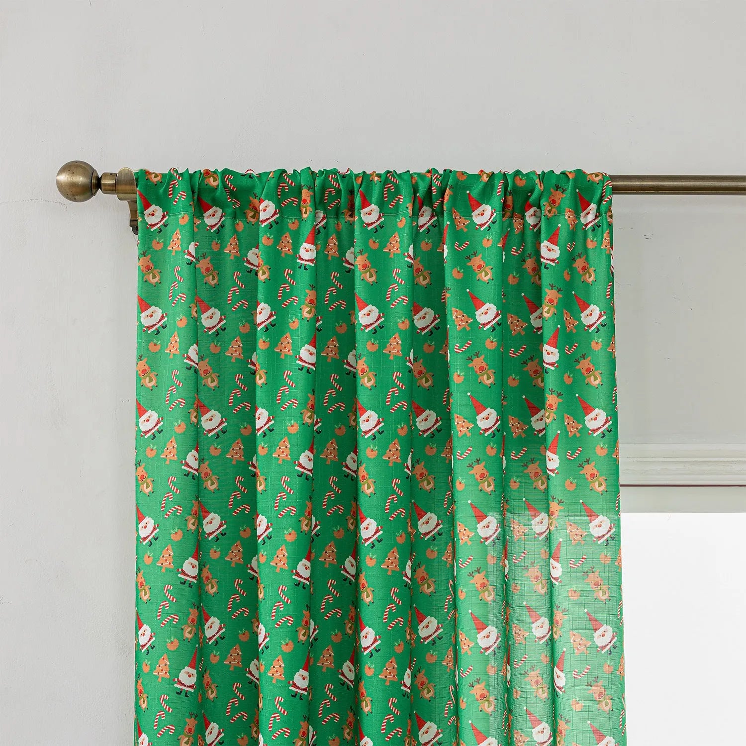 Green Christmas curtain with snowman and angel cartoon print, 1 metre wide