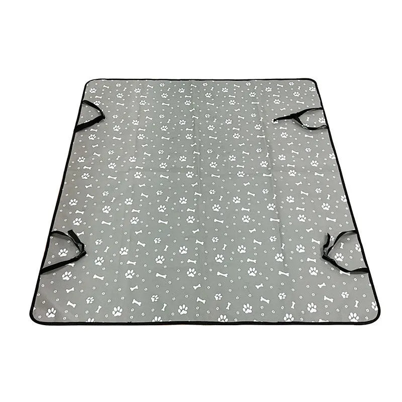 Grey cloth car pet mat with dog bone print protecting a car rear seat