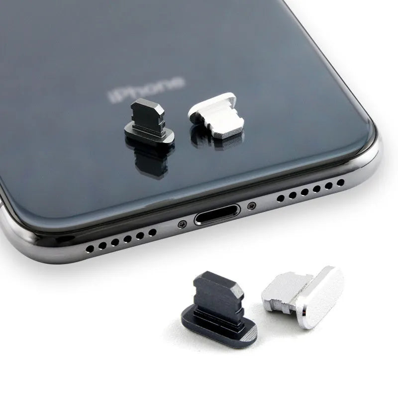 Aluminium alloy mobile phone charging port dust plug for iPhone, shown in a metallic colour.