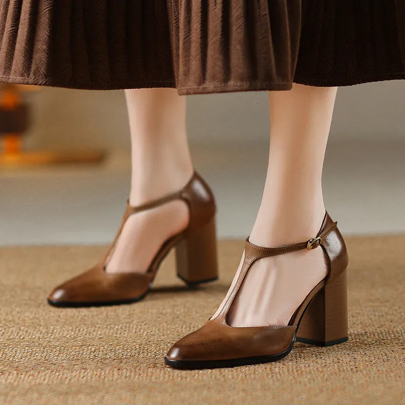 Women's dark brown retro pointed toe Mary Jane shoes with buckle and Baotou hollow design.