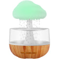 White cloud-shaped humidifier with colour-changing lights and USB charging port