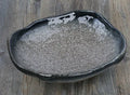 Japanese coarse pottery sashimi bowl with irregular shape and floral glaze decorations