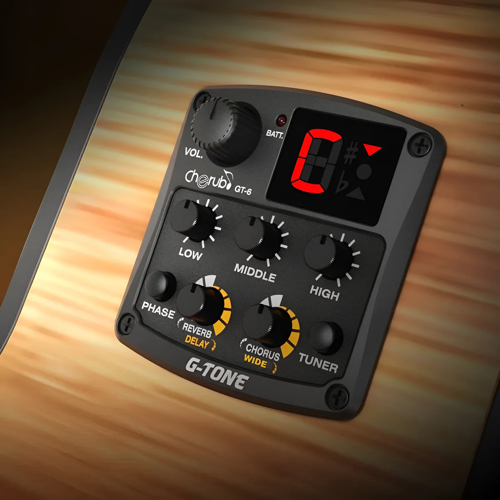 Black Cherub GT-6 acoustic guitar hole-mount preamp with volume, tone, EQ, and effects knobs.