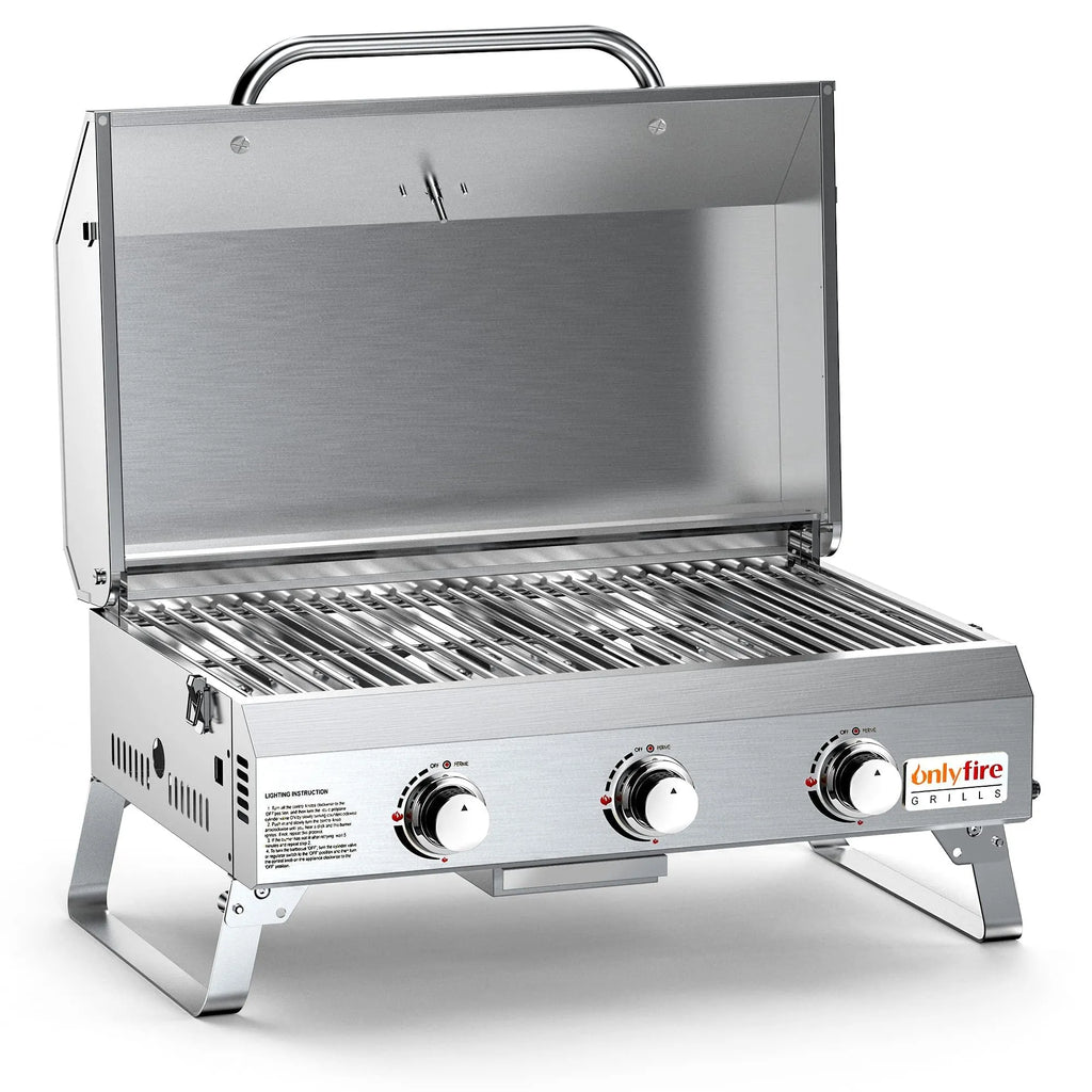 Silver stainless steel desktop gas barbecue grill with three burners and foldable legs.