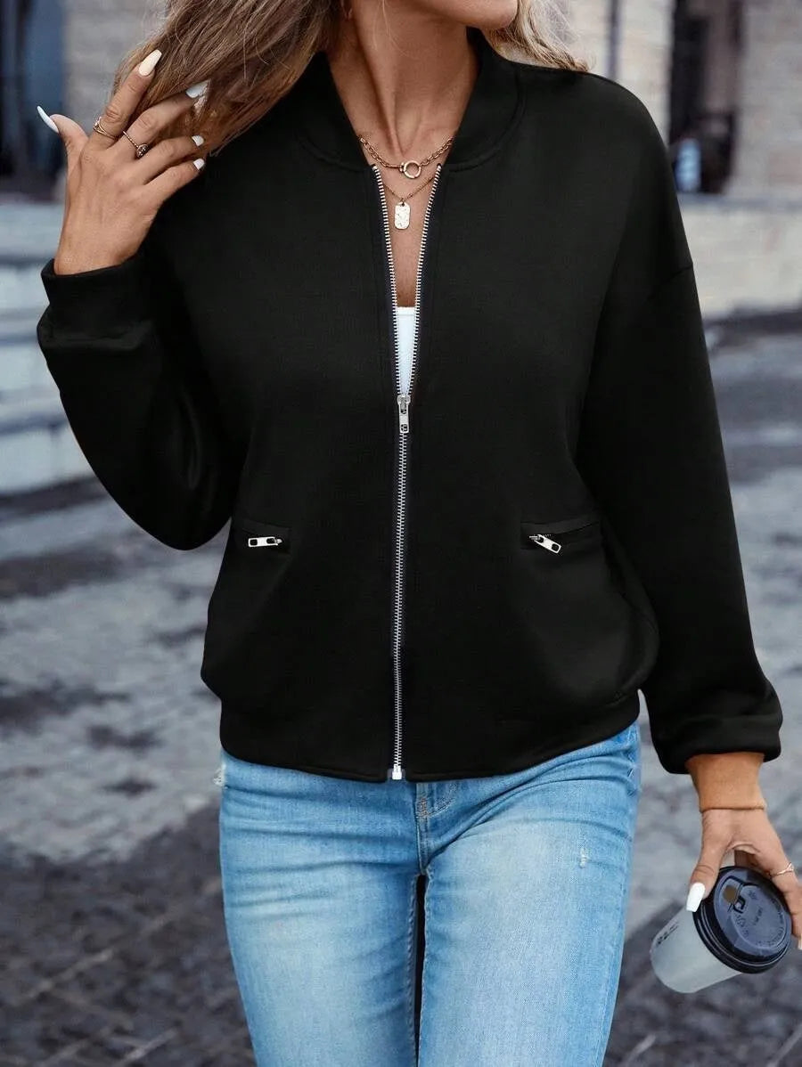 Black women's long sleeve zip jacket with faux pockets, casual style.