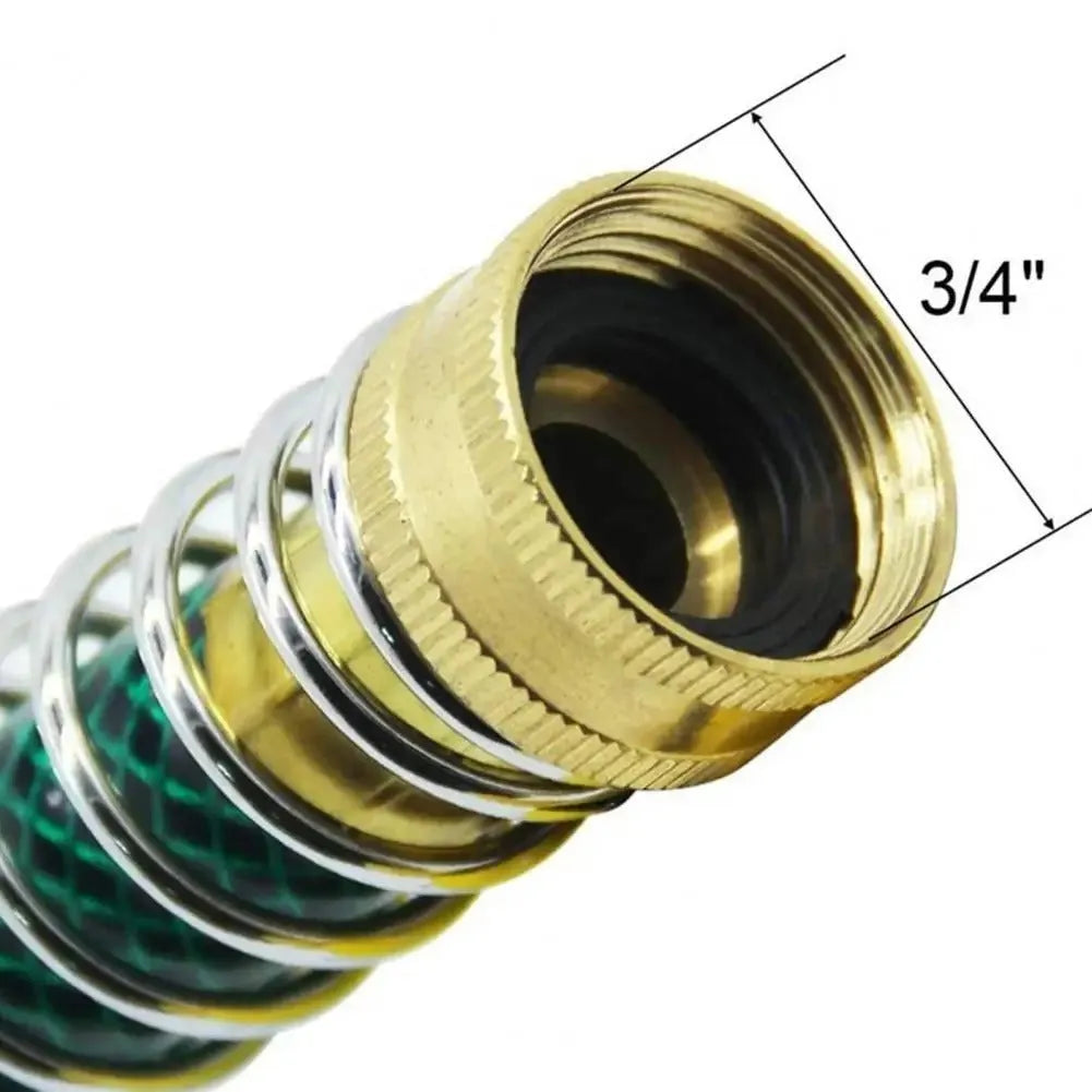 Brass garden hose connector with visible spiral spring, shown next to a measuring tape indicating 15 cm length.