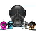 Limited edition Skull-shaped portable Bluetooth speaker in black, showing compact size.