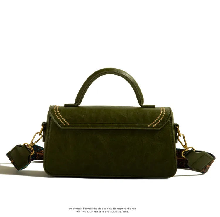 Brown retro messenger bag with square vertical shape showing front sandwich pocket and shoulder strap.