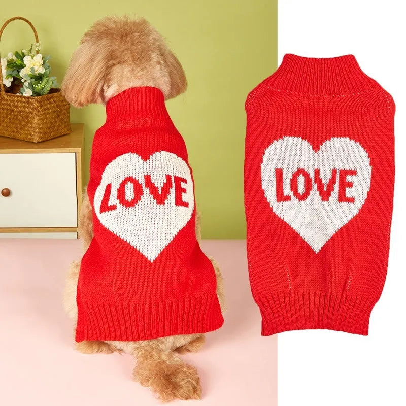 Red love heart design on a pink acrylic dog sweater for a small dog.