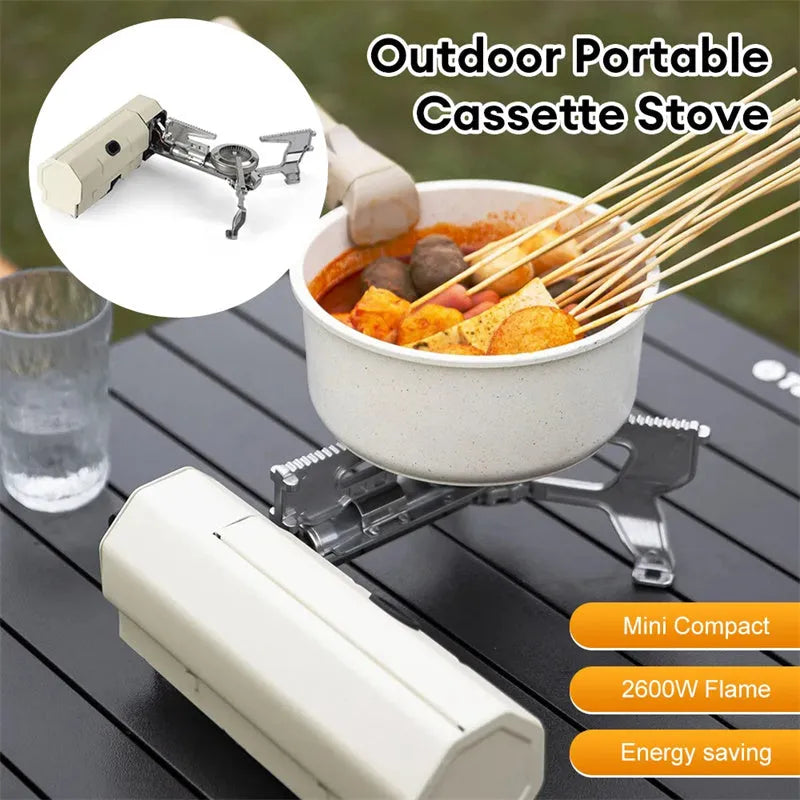 Green portable folding camping gas stove with adjustable valve on a serrated bracket, shown with its storage bag.