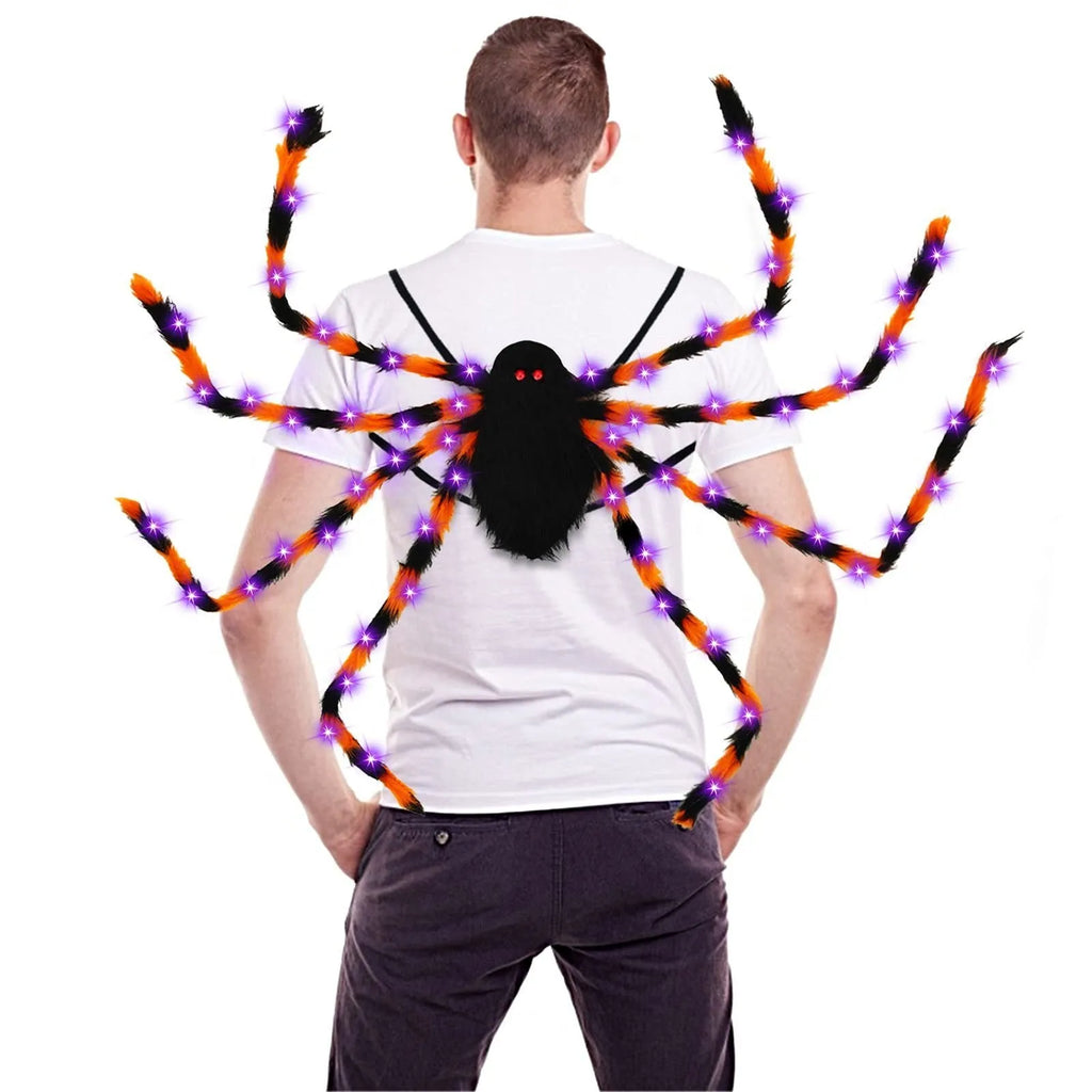 Halloween spider backpack with LED lights in plush sugar bag design shown in orange purple light colour
