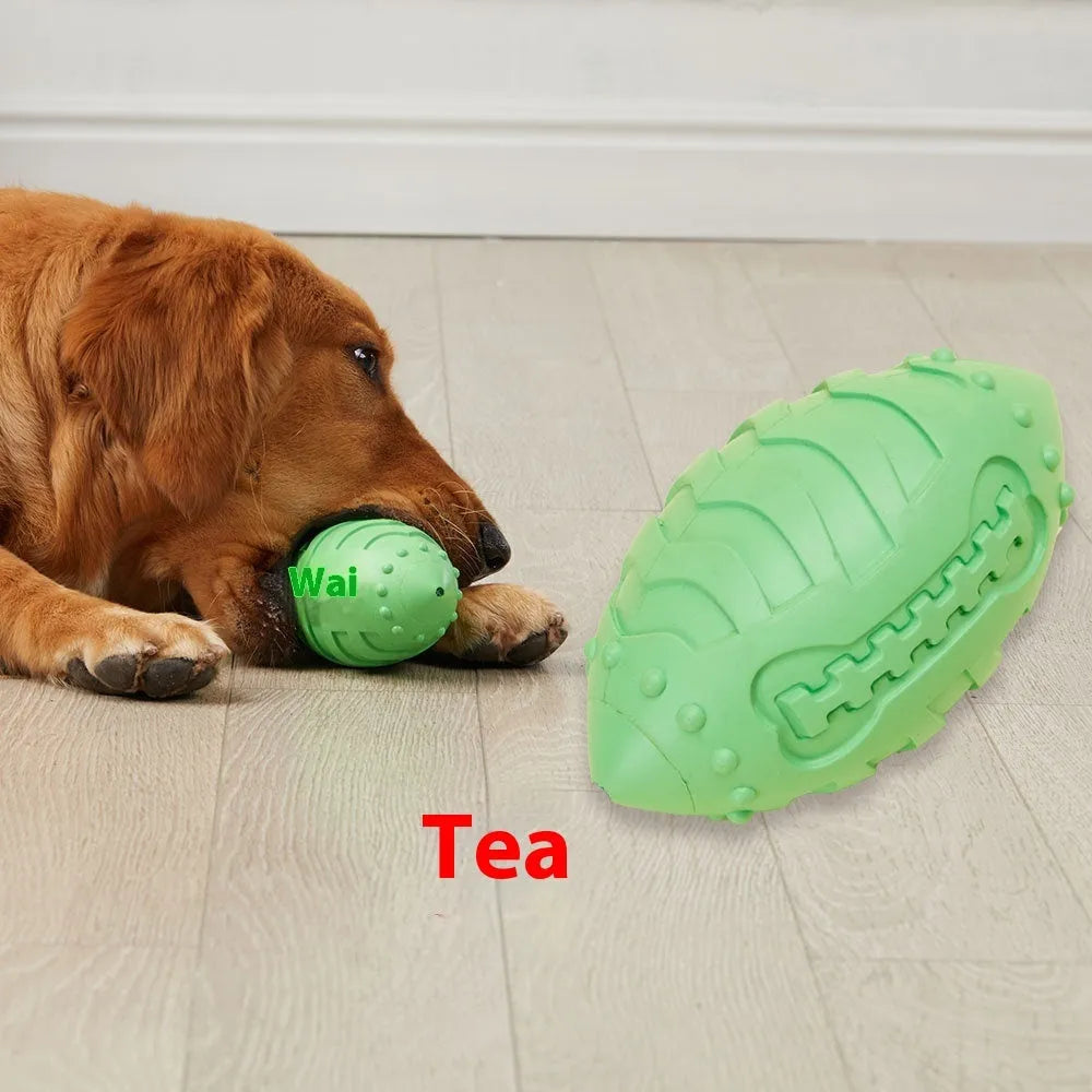 Thick rubber rugby ball dog toy in light green or sapphire blue with vocal sound feature