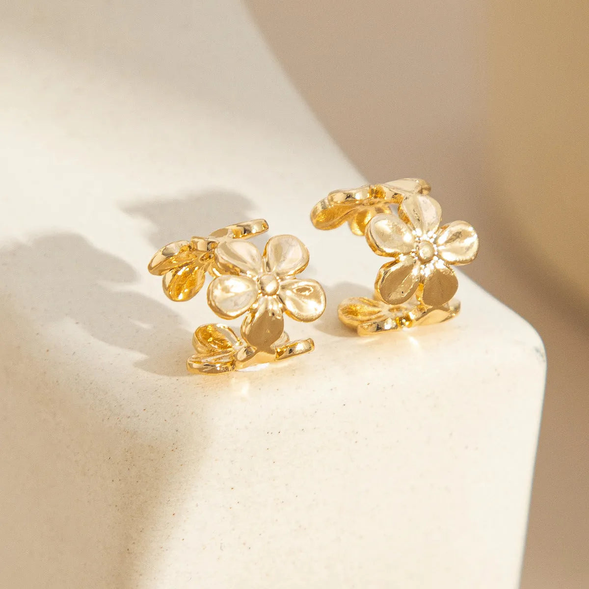 Gold starfish and scallop drop earrings with conch details for women's beach jewellery