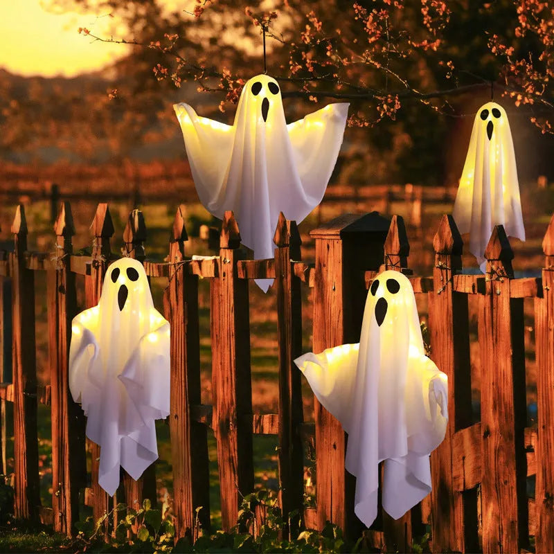 White and orange cloth ghost scream LED Halloween light ornament with 4.5V battery compartment.