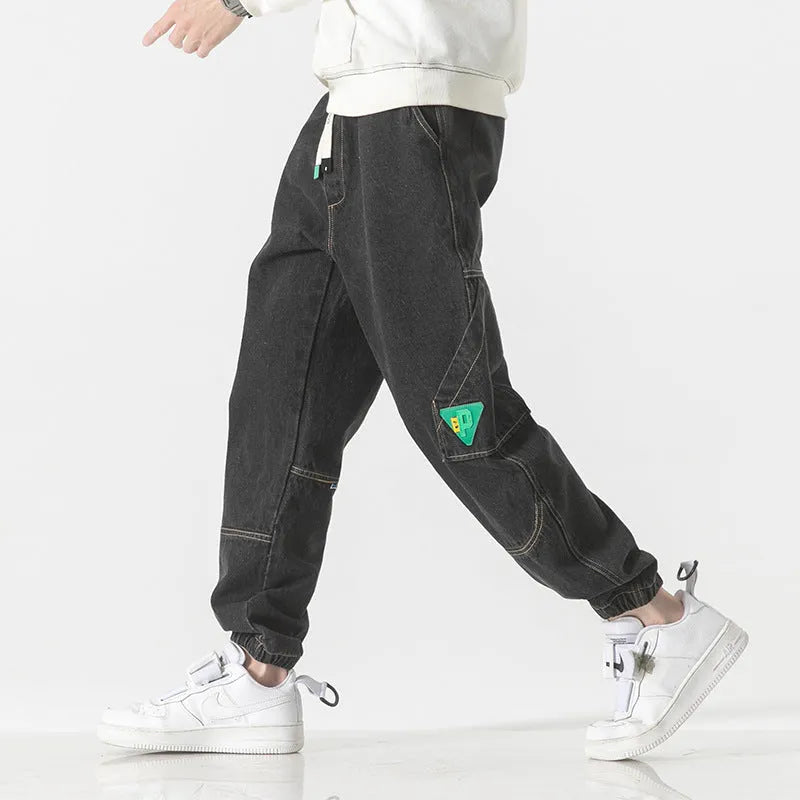 Men's loose-fit tapered cotton trousers in black, blue and grey colours