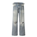 Blue men's straight-leg jeans with ripped distressing detail on the legs.