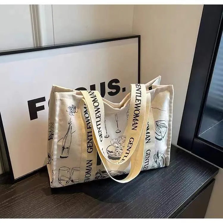 Large capacity canvas tote bag showing three design options: black letters, coloured letters, and pattern print