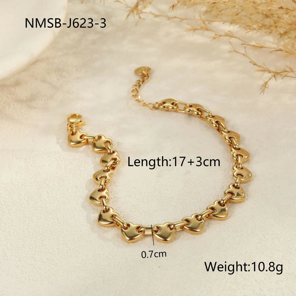 Stainless steel hollow heart bracelet with 18K gold plating in geometric style