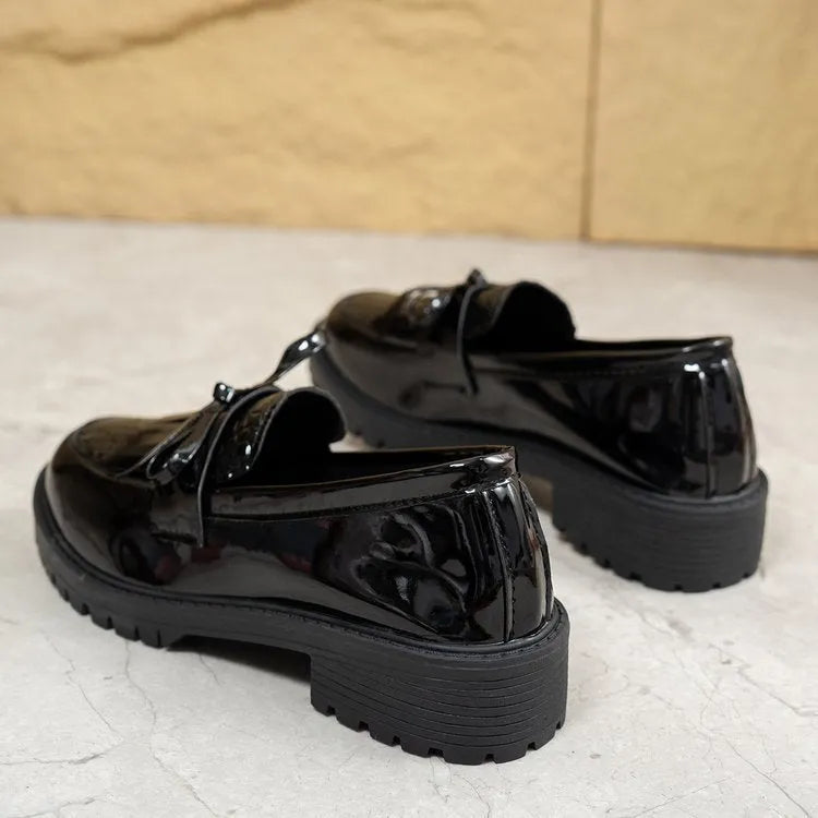 Women's black and brown bow loafers with artificial PU upper, shown in EU sizes 36-43.