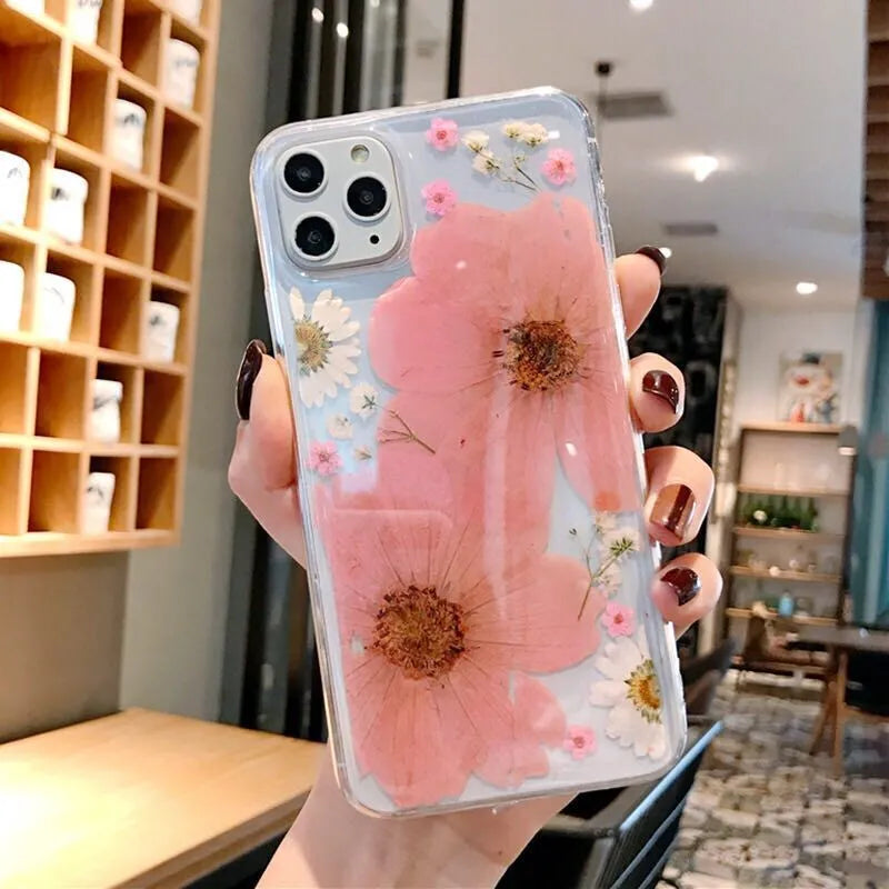 Floral TPU phone case with large pink and yellow flower designs for iPhone models