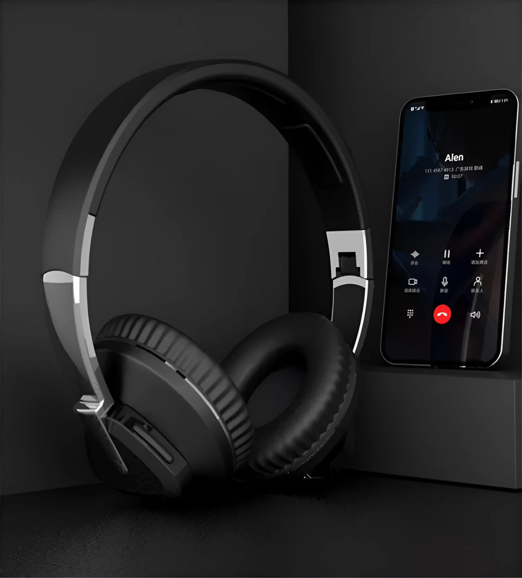 Wireless over-ear headset in black with Bluetooth logo, AUX jack, and TF card slot visible.