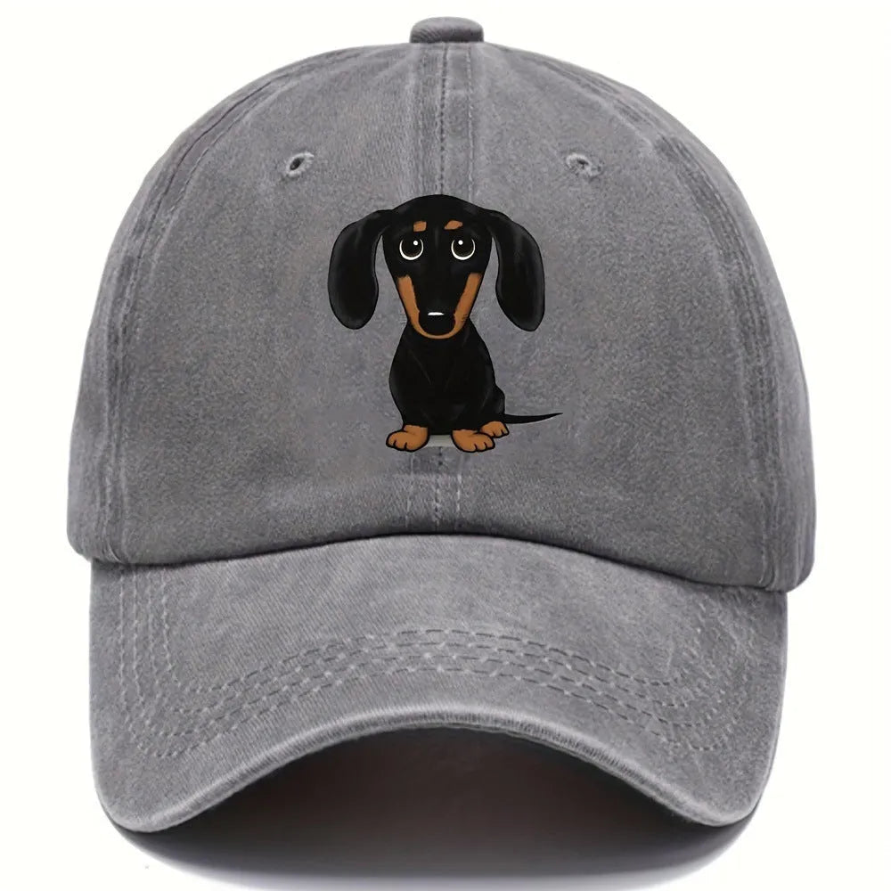Retro washed blue cotton baseball cap with an embroidered brown dachshund design on the front.