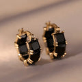 Geometric U-shaped women's earrings with round crystal zirconium stones in gold electroplated copper setting