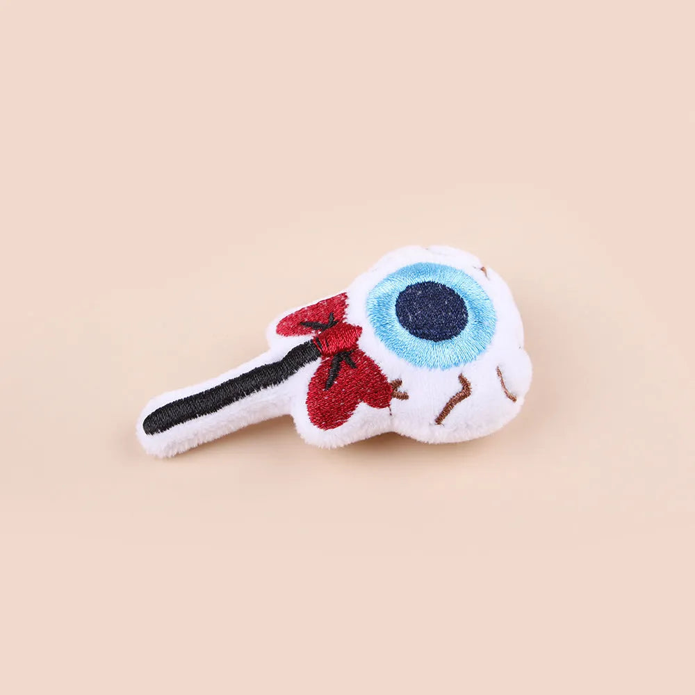 Small plush cat teaser toy with flexible handle in candy, eyes, or skull design