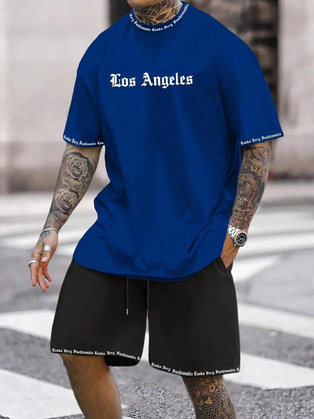 Sports style short sleeve top and shorts set in thin quick-drying fabric, shown in a printed pattern.