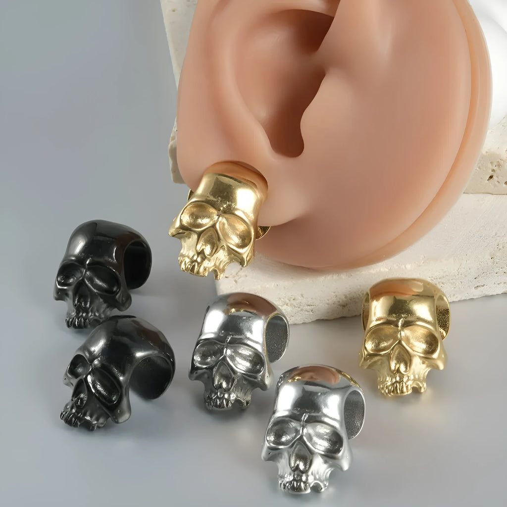 Stainless steel hollow skull Buddha earrings with geometric design and electroplated colour finishes