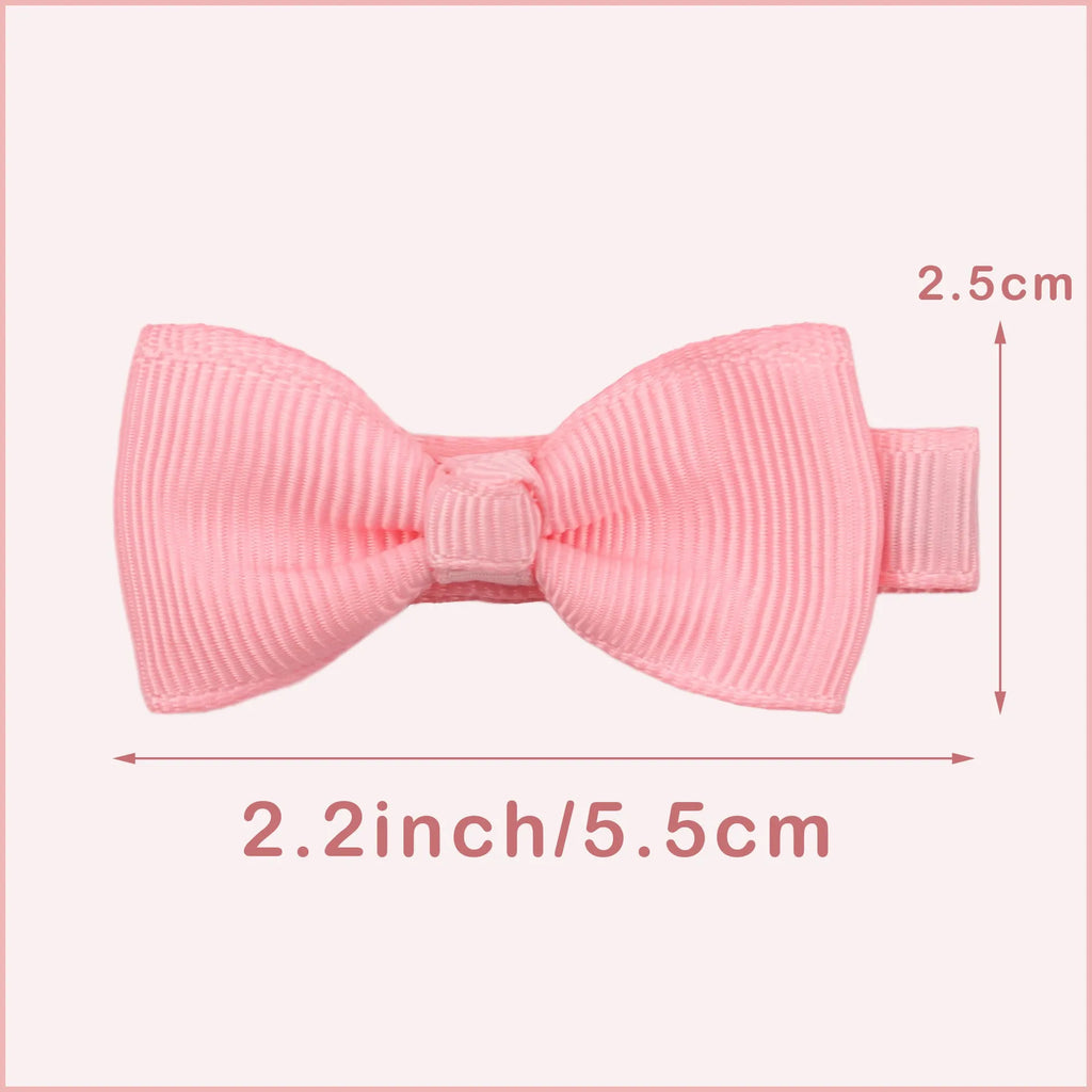 Assortment of pastel coloured baby hair clips and bows with no-slip lining.