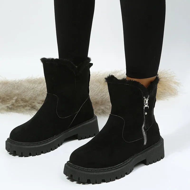 Women's black faux suede high-top snow boots with thick plush lining and a side zipper
